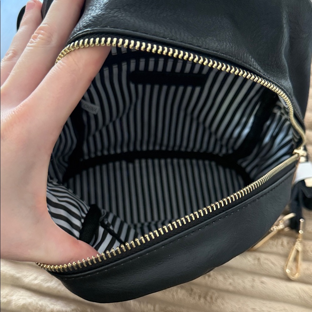 Chic Black Backpack With Gold Hardware - image 3